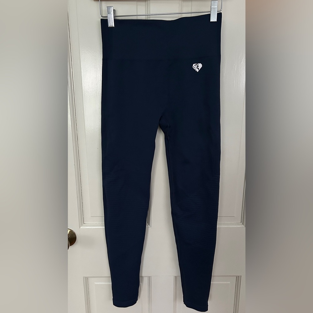 Woman Within Dark Blue Leggings